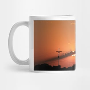 Kansas Orange Sunset with Power lines out in the Country. Mug